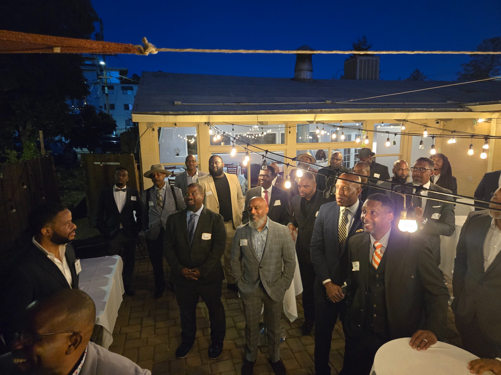 Kwame Fields with members of 100 Black Men of the Bay Area at an evening gathering